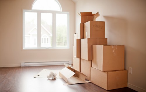Moving team loading furniture and boxes into a van for Dulwich customers