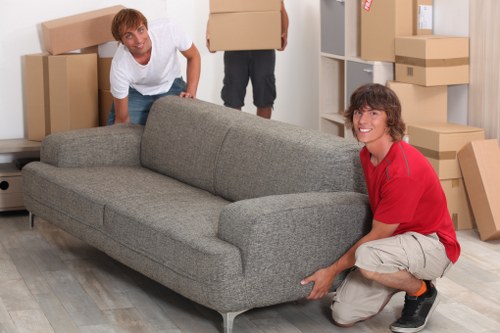 Worker using safety equipment during a removal van job
