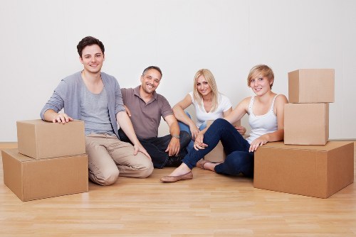 Professional house moving team working carefully in a Dulwich property