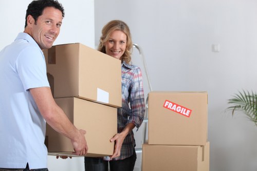 Business relocation vehicles and moving equipment near Dulwich streets
